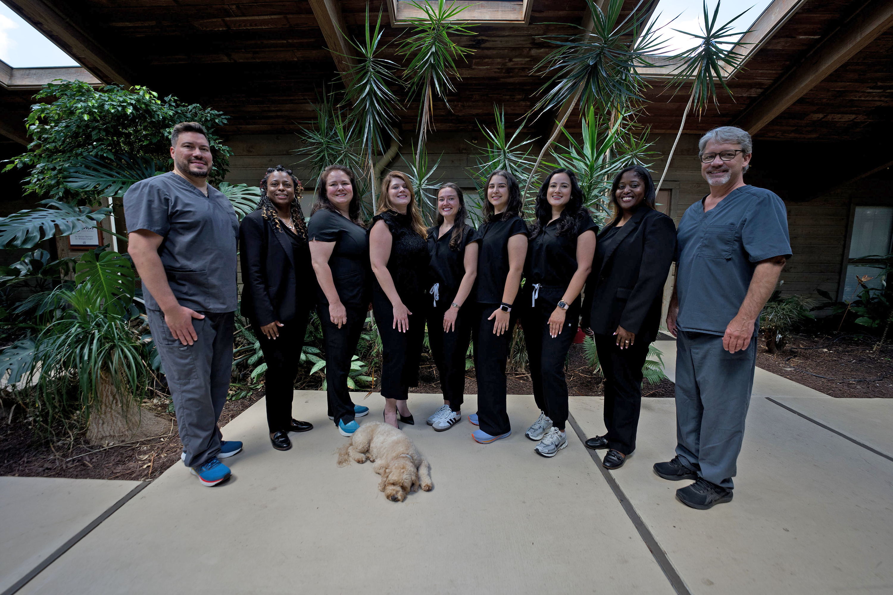 The Barrero Dental Boutique team standing together outside the practice